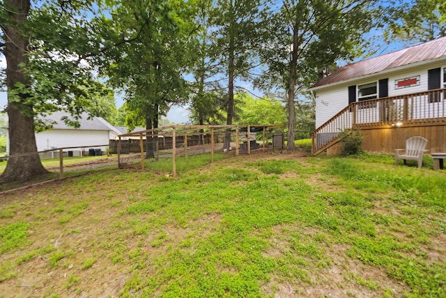 1602 Pleasant Grove Rd, Westmoreland, TN 37186 - view of yard featuring a wooden deck and stairway