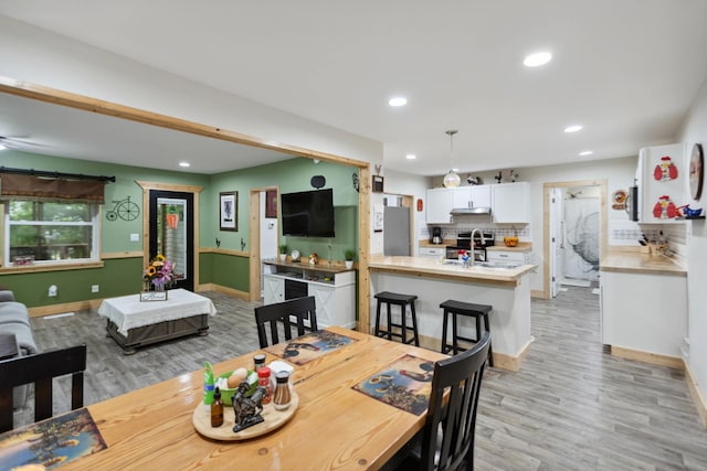1602 Pleasant Grove Rd, Westmoreland, TN 37186 - dining room featuring light wood finished floors, recessed lighting, and baseboards