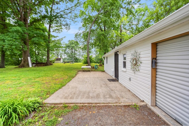 1602 Pleasant Grove Rd, Westmoreland, TN 37186 - view of green lawn with a patio