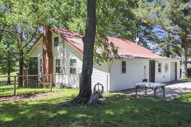 1602 Pleasant Grove Rd, Westmoreland, TN 37186 - back of house with metal roof