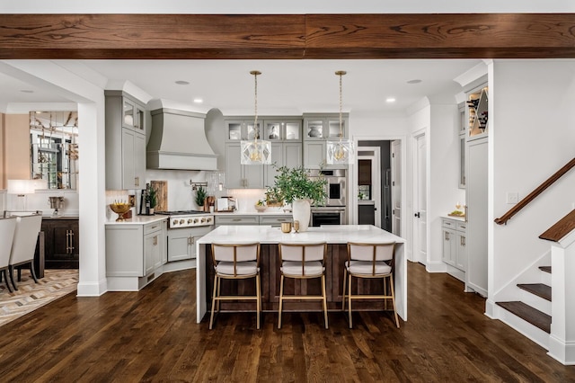 505 Green Apple Turn, Brentwood, TN 37027 - kitchen with gray cabinets, custom exhaust hood, appliances with stainless steel finishes, light countertops, and recessed lighting