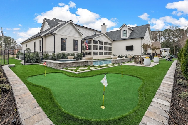 505 Green Apple Turn, Brentwood, TN 37027 - rear view of property with a putting green, a patio area, a chimney, and a sunroom