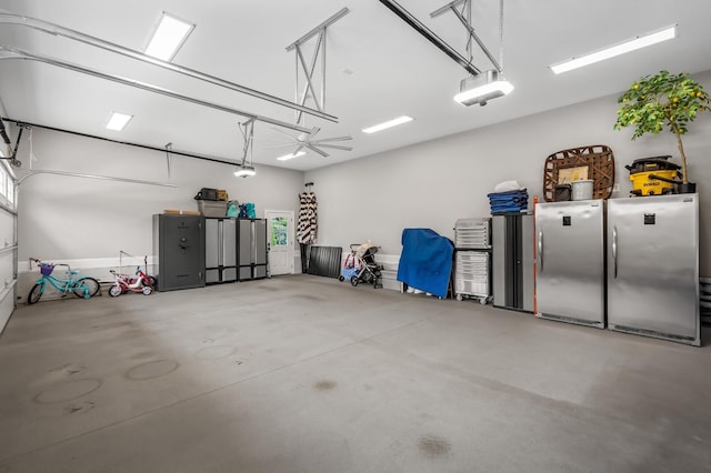 505 Green Apple Turn, Brentwood, TN 37027 - garage featuring freestanding refrigerator and a garage door opener