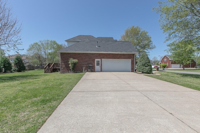 206 Sayre Ln, Murfreesboro, TN 37127 - view of side of home featuring a yard, brick siding, a garage, driveway, and a shingled roof