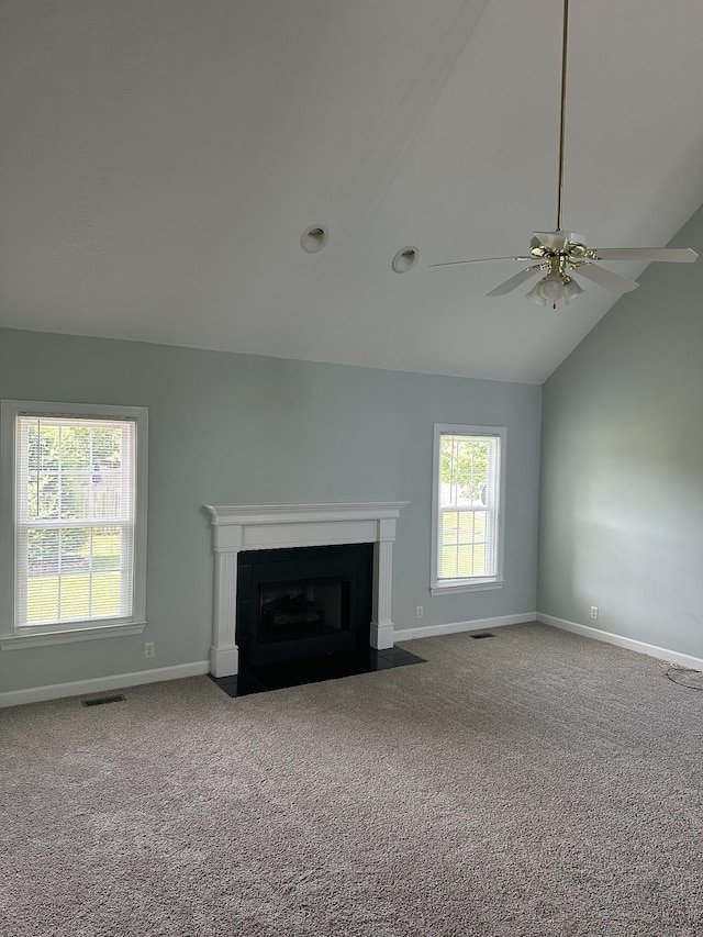 206 Sayre Ln, Murfreesboro, TN 37127 - unfurnished living room featuring carpet floors, vaulted ceiling, baseboards, a fireplace with flush hearth, and a ceiling fan