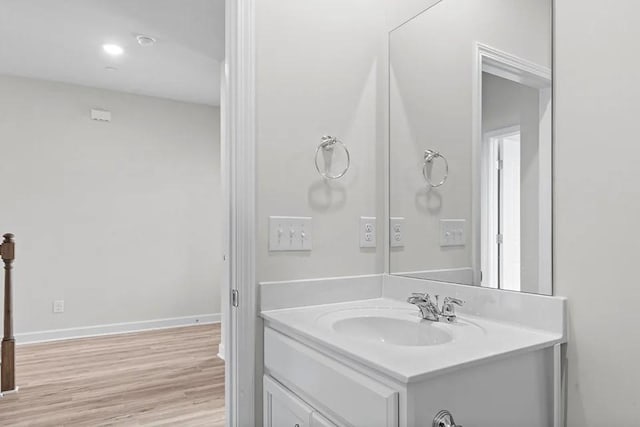 2502 Beverly Gail Rd, Pleasant View, TN 37146 - bathroom with vanity, wood finished floors, and baseboards