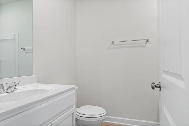 2502 Beverly Gail Rd, Pleasant View, TN 37146 - bathroom featuring vanity, toilet, and baseboards