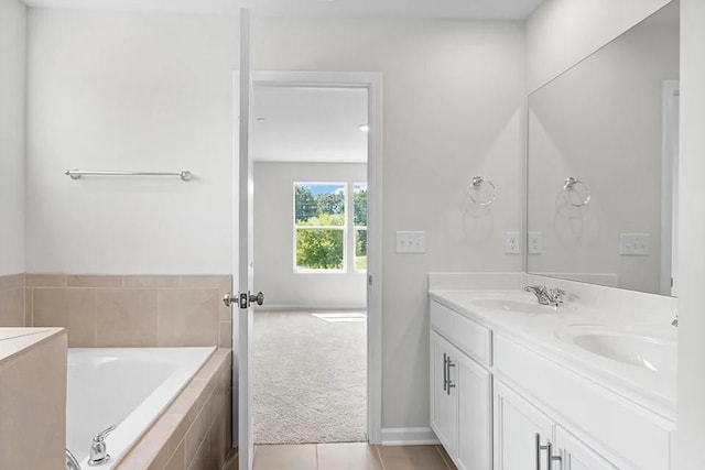 2502 Beverly Gail Rd, Pleasant View, TN 37146 - full bathroom featuring double vanity, a garden tub, tile patterned flooring, and baseboards