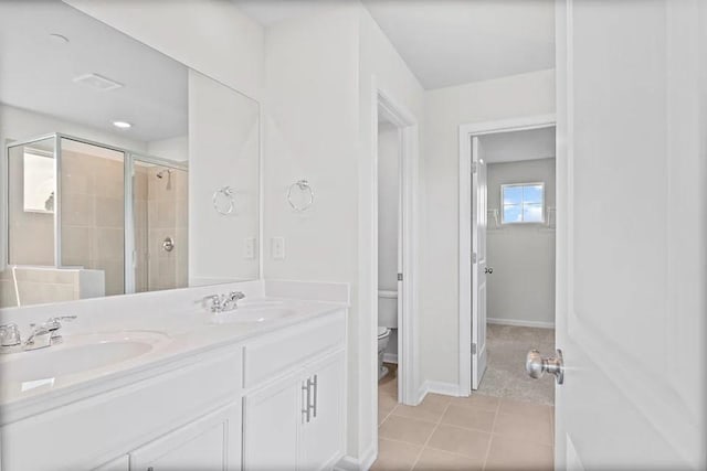 2502 Beverly Gail Rd, Pleasant View, TN 37146 - bathroom featuring toilet, double vanity, a stall shower, tile patterned flooring, and baseboards