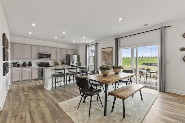 2502 Beverly Gail Rd, Pleasant View, TN 37146 - dining area featuring recessed lighting, light wood-style floors, and baseboards