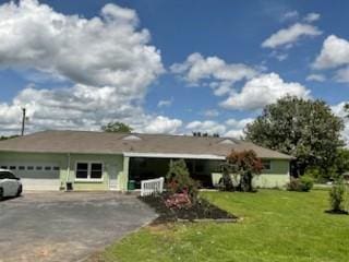 904 Apple Valley Rd, Madison, TN 37115 - ranch-style house featuring driveway, a garage, and a front yard