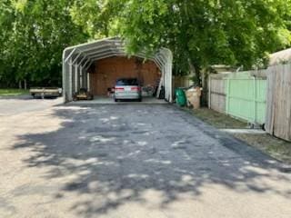 904 Apple Valley Rd, Madison, TN 37115 - view of parking / parking lot with a carport and driveway