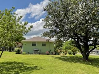 904 Apple Valley Rd, Madison, TN 37115 - rear view of property with a lawn
