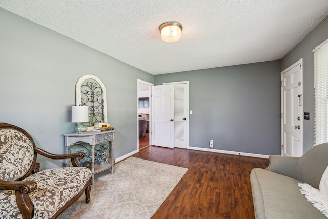 979 S Main St S, Eagleville, TN 37060 - sitting room featuring wood finished floors, baseboards, and a textured ceiling