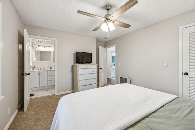 979 S Main St S, Eagleville, TN 37060 - carpeted bedroom featuring a ceiling fan, ensuite bathroom, a textured ceiling, baseboards, and a closet