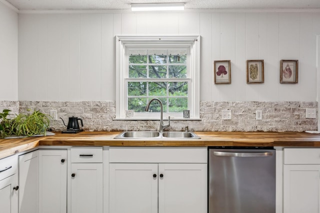 979 S Main St S, Eagleville, TN 37060 - kitchen featuring wood counters, stainless steel dishwasher, a sink, and backsplash