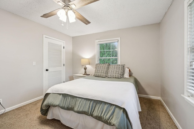 979 S Main St S, Eagleville, TN 37060 - bedroom featuring carpet floors, baseboards, a textured ceiling, a ceiling fan, and a closet