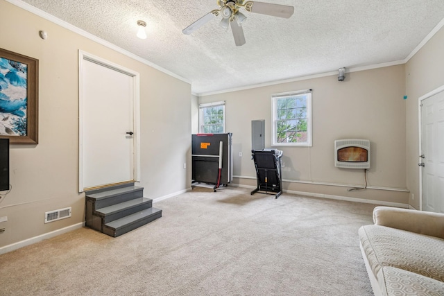 979 S Main St S, Eagleville, TN 37060 - living area with heating unit, carpet floors, ornamental molding, ceiling fan, and baseboards