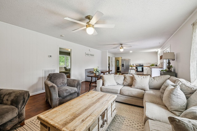 979 S Main St S, Eagleville, TN 37060 - living area with a ceiling fan, light wood-type flooring, and a textured ceiling