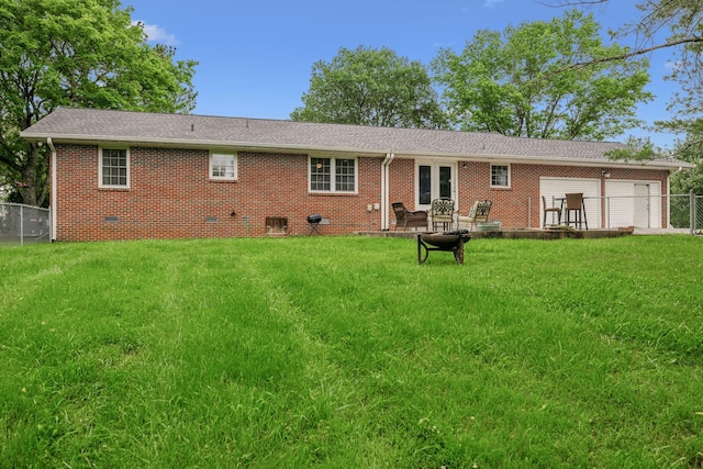 979 S Main St S, Eagleville, TN 37060 - back of house with crawl space, brick siding, a garage, and roof with shingles