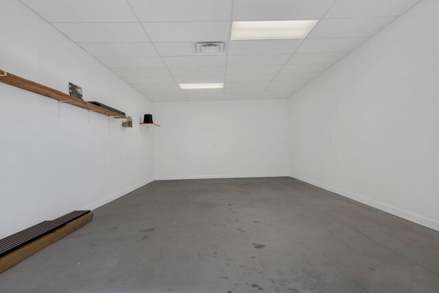 1310 Oak Grove Rd, Dickson, TN 37055 - basement with a paneled ceiling and baseboards
