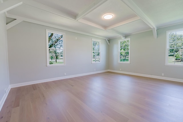 1405 SE Broad St, Murfreesboro, TN 37130 - unfurnished room with wood finished floors, beamed ceiling, and baseboards