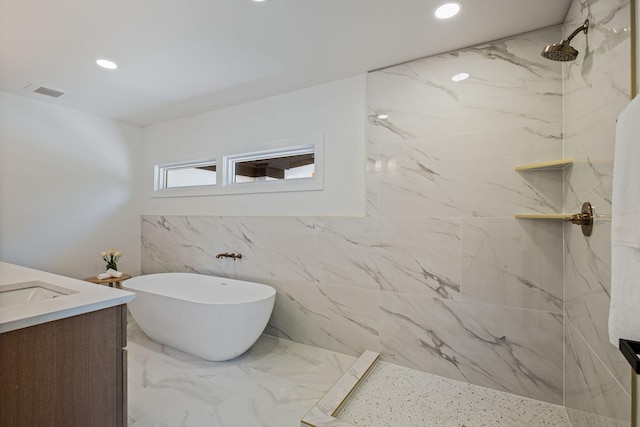 1412 Knox Valley Dr, Brentwood, TN 37027 - bathroom featuring a freestanding tub, vanity, a marble finish shower, recessed lighting, and tile walls