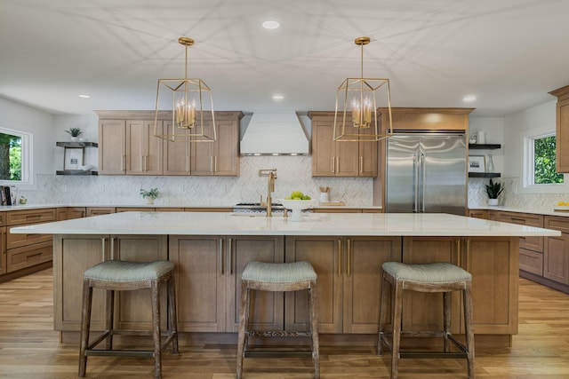 1412 Knox Valley Dr, Brentwood, TN 37027 - kitchen featuring built in refrigerator, custom exhaust hood, open shelves, backsplash, and a large island