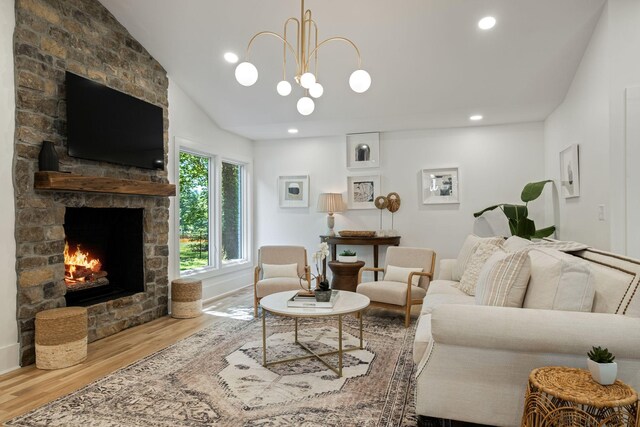 1412 Knox Valley Dr, Brentwood, TN 37027 - living room with wood finished floors, a fireplace, vaulted ceiling, recessed lighting, and a chandelier