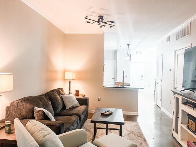 1803 Broadway Unit 509, Nashville, TN 37203 - living area featuring concrete floors, crown molding, and baseboards