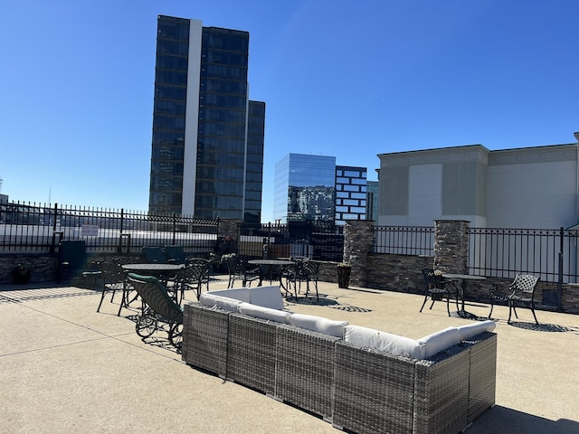 1803 Broadway Unit 509, Nashville, TN 37203 - view of patio featuring an outdoor living space and a city view
