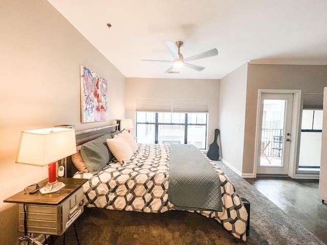 1803 Broadway Unit 509, Nashville, TN 37203 - bedroom featuring baseboards, a ceiling fan, and access to exterior