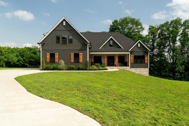 1995 Templow Rd, Bethpage, TN 37022 - view of front of home featuring a front lawn and board and batten siding
