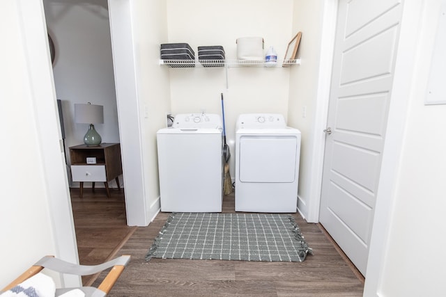 4303 Gallatin Pike Unit 206, Nashville, TN 37216 - laundry room with washer and dryer, wood finished floors, and baseboards