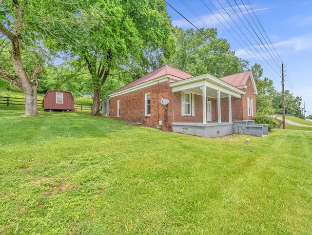 1914 Mill St, Pulaski, TN 38478 - view of property exterior featuring crawl space, covered porch, and brick siding