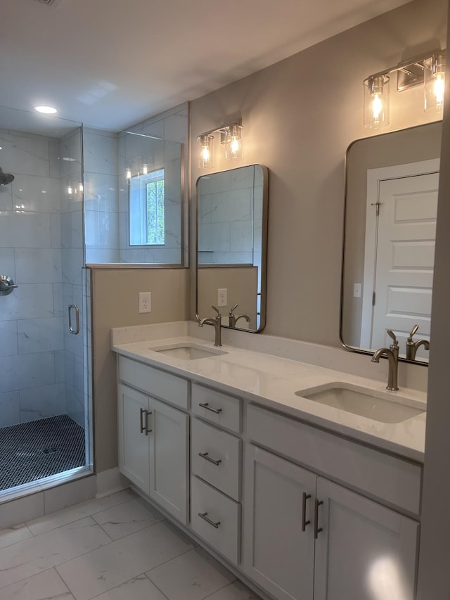 5930 Carl Pl, Nashville, TN 37209 - bathroom featuring marble finish floors, double vanity, and a shower stall