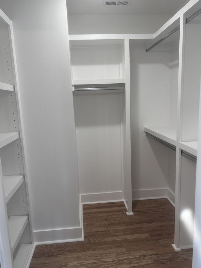 5930 Carl Pl, Nashville, TN 37209 - walk in closet with dark wood finished floors