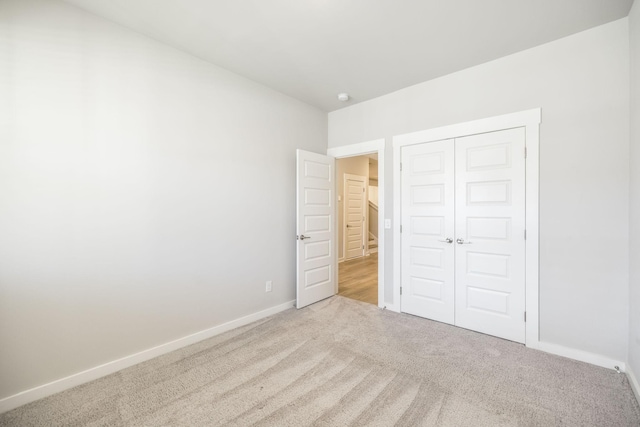 441 Golden Meadow Ln, Hendersonville, TN 37075 - unfurnished bedroom featuring carpet, a closet, and baseboards