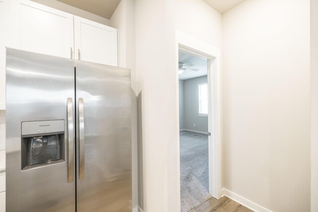 441 Golden Meadow Ln, Hendersonville, TN 37075 - kitchen featuring stainless steel refrigerator with ice dispenser, baseboards, white cabinetry, light wood-type flooring, and ceiling fan