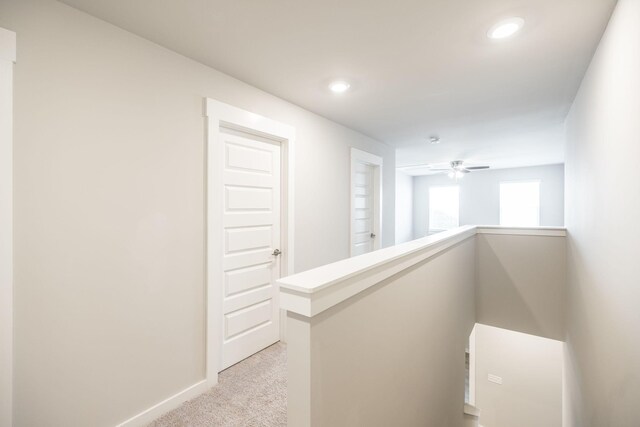 441 Golden Meadow Ln, Hendersonville, TN 37075 - hall with light carpet, an upstairs landing, baseboards, and recessed lighting