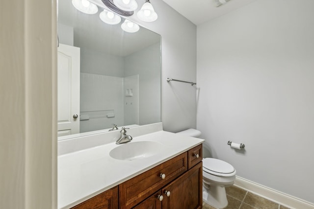 735 Tulip Grove Rd Unit 325, Hermitage, TN 37076 - bathroom featuring toilet, vanity, tile patterned floors, and baseboards