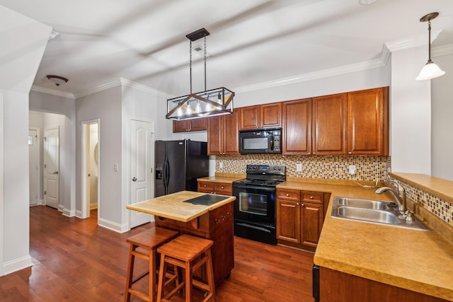 735 Tulip Grove Rd Unit 325, Hermitage, TN 37076 - kitchen featuring black appliances, a sink, tasteful backsplash, ornamental molding, and dark wood-type flooring
