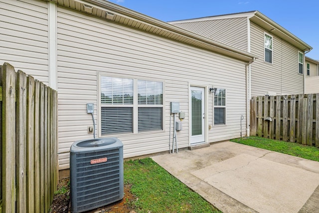 735 Tulip Grove Rd Unit 325, Hermitage, TN 37076 - back of house with cooling unit and a patio