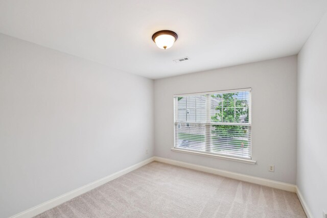 735 Tulip Grove Rd Unit 325, Hermitage, TN 37076 - unfurnished room featuring baseboards and light carpet
