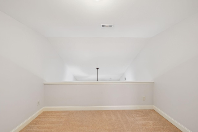 735 Tulip Grove Rd Unit 325, Hermitage, TN 37076 - empty room featuring vaulted ceiling, light colored carpet, and baseboards