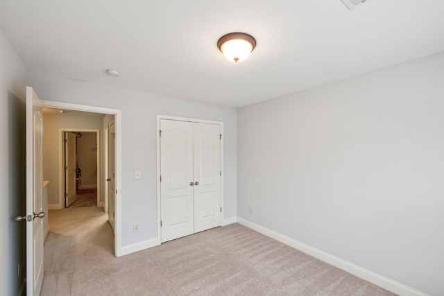 735 Tulip Grove Rd Unit 325, Hermitage, TN 37076 - unfurnished bedroom with carpet flooring, a closet, and baseboards