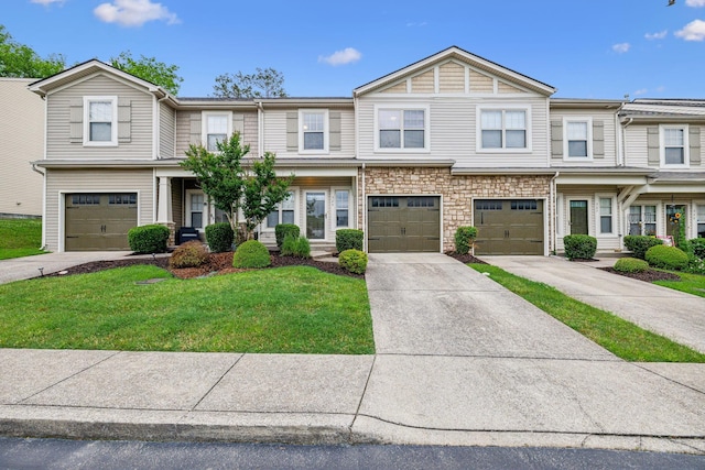 735 Tulip Grove Rd Unit 325, Hermitage, TN 37076 - view of property with driveway, a front lawn, and an attached garage