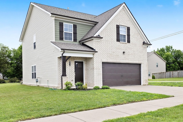 1339 Raden Dr, Lebanon, TN 37087 - view of front of home with a garage, driveway, a shingled roof, and brick siding