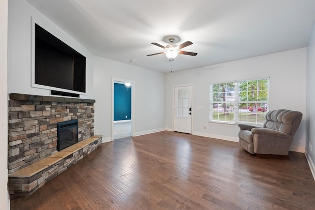 190 Twin Ct, Woodbury, TN 37190 - unfurnished living room featuring ceiling fan, a fireplace, dark wood-style floors, and baseboards