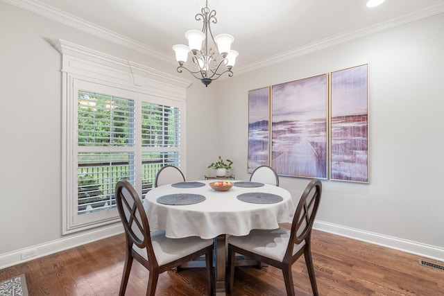2725 Cherrydale Dr, Lebanon, TN 37087 - dining area featuring a chandelier, baseboards, wood finished floors, and crown molding